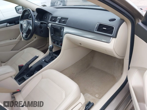 2015 Volkswagen Passat 1.8T Limited Edition with VIN 1VWAT7A32FC120769, listed as a IAAI auction lot 42013547 with 61,451 mi miles. Bid and sale history available at carsss.com. Image 5.