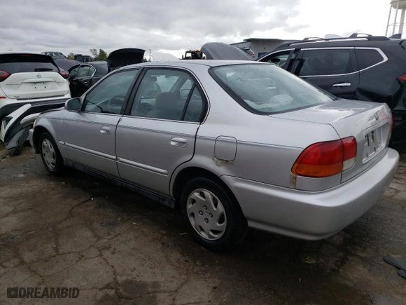 1997 Honda Civic EX with VIN 1HGEJ8647VL018949, listed as a Copart auction lot 72557904 with 162,531 mi miles and Salvage Title. Bid and sale history available at carsss.com. Image 2.