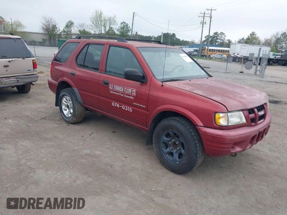 2004 Isuzu Rodeo S z VIN 4S2CK58W644317345, wystawiony jako IAAI lot #41940961 z przebiegiem Nie podano mil oraz . Historia ofert i sprzedaży dostępna na DreamBid. Obrazek 1.