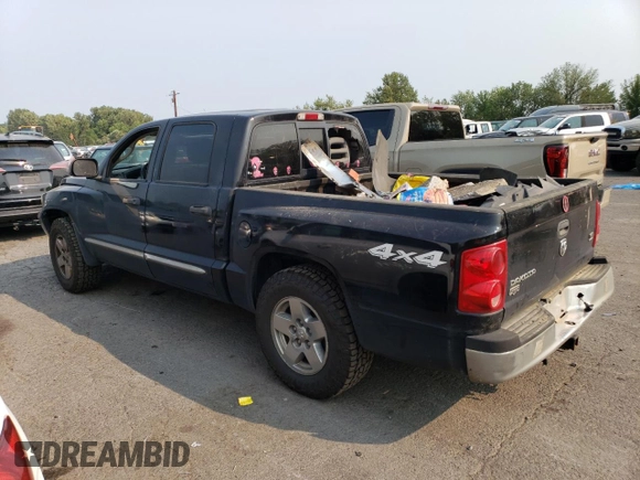 2005 Dodge Dakota Laramie with VIN 1D7HW58N65S161629, listed as a Copart auction lot 66570164 with 205,984 mi miles and Salvage Title. Bid and sale history available at DreamBid. Image 2.