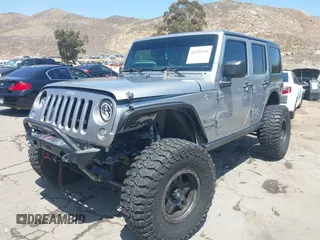 2018 Jeep Wrangler Unlimited Sport with VIN 1C4BJWDG4JL807265, listed as a IAAI auction lot 42520648 with 69,229 mi miles and . Bid and sale history available at DreamBid. Image 19.