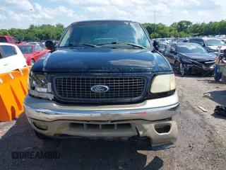 2002 Ford Expedition Eddie Bauer with VIN 1FMPU18L62LA76777, listed as a IAAI auction lot 42718720 with Not provided miles and . Bid and sale history available at DreamBid. Image 6.
