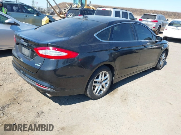 2013 Ford Fusion SE z VIN 3FA6P0HRXDR220248, wystawiony jako IAAI lot #42777273 z przebiegiem 156 603 mil mil oraz . Historia ofert i sprzedaży dostępna na DreamBid. Obrazek 4.