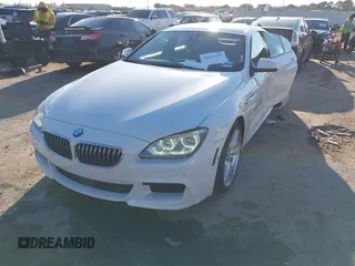 2015 BMW 6 Series 640i xDrive with VIN WBA6B8C50FD453317, listed as a IAAI auction lot 41635430 with 77,811 mi miles and . Bid and sale history available at DreamBid. Image 17.