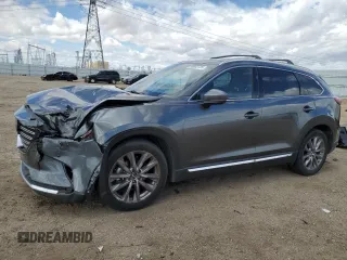 2021 Mazda CX-9 Grand Touring z VIN JM3TCBDY7M0536781, wystawiony jako Copart lot #55862725 z przebiegiem 62 131 mil mil oraz Szkoda całkowita • Salvage title. Historia ofert i sprzedaży dostępna na DreamBid. Obrazek 1.