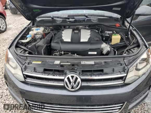 2012 Volkswagen Touareg Sport z VIN WVGFK9BP6CD005005, wystawiony jako Copart lot #46802355 z przebiegiem 141 430 mil mil oraz Czysty tytuł • Clean title. Historia ofert i sprzedaży dostępna na DreamBid. Obrazek 12.