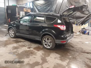 2014 Ford Escape SE with VIN 1FMCU9GX7EUA80983, listed as a IAAI auction lot 41504942 with 133,952 mi miles. Bid and sale history available at carsss.com. Image 3.