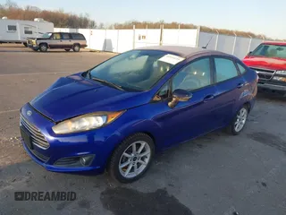 2014 Ford Fiesta SE z VIN 3FADP4BJ5EM243551, wystawiony jako IAAI lot #41919239 z przebiegiem 92 396 mil mil oraz . Historia ofert i sprzedaży dostępna na DreamBid. Obrazek 2.