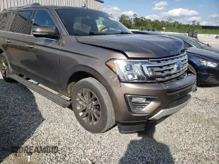 2019 Ford Expedition Max Limited z VIN 1FMJK2AT9KEA20977, wystawiony jako Copart lot #56198015 z przebiegiem 104 093 mil mil oraz Szkoda całkowita • Salvage title. Historia ofert i sprzedaży dostępna na DreamBid. Obrazek 14.