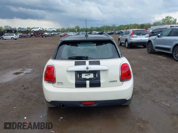 2015 MINI Hardtop 4 Door with VIN WMWXS5C52FT831291, listed as a IAAI auction lot 42179801 with 63,261 mi miles and . Bid and sale history available at DreamBid. Image 17.