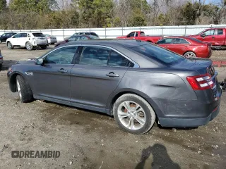 2015 Ford Taurus SEL with VIN 1FAHP2H86FG115860, listed as a Copart auction lot 43218065 with 99,548 mi miles and Salvage Title. Bid and sale history available at DreamBid. Image 2.