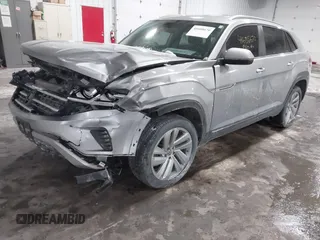 2021 Volkswagen Atlas SE z VIN 1V2HE2CA9MC219076, wystawiony jako IAAI lot #41608670 z przebiegiem 56 162 mil mil oraz . Historia ofert i sprzedaży dostępna na DreamBid. Obrazek 2.