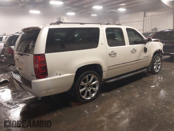 2010 Chevrolet Suburban LTZ with VIN 1GNUKKE32AR271253, listed as a IAAI auction lot 41161374 with 164,184 mi miles. Bid and sale history available at carsss.com. Image 4.