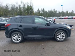 2013 Mazda CX-5 Grand Touring with VIN JM3KE2DEXD0124270, listed as a IAAI auction lot 41942120 with 109,087 mi miles. Bid and sale history available at carsss.com. Image 13.