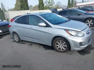 2014 Hyundai Accent GLS with VIN KMHCT4AE6EU586785, listed as a IAAI auction lot 41674060 with 135,355 mi miles. Bid and sale history available at carsss.com. Image 13.