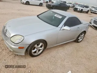 2001 Mercedes-Benz SLK 230/320 z VIN WDBKK65F91F228336, wystawiony jako Copart lot #56834915 z przebiegiem 127 224 mil mil oraz Szkody całkowita. Historia ofert i sprzedaży dostępna na DreamBid. Obrazek 1.