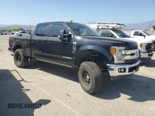2019 Ford F-350 XL with VIN 1FT8W3BT0KED37509, listed as a Copart auction lot 60283655 with 122,571 mi miles and Salvage title. Bid and sale history available at DreamBid. Image 4.