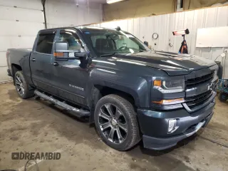 2018 Chevrolet Silverado 1500 LT with VIN 3GCUKREC5JG121283, listed as a Copart auction lot 49836155 with 95,838 mi miles and Salvage Title. Bid and sale history available at DreamBid. Image 4.