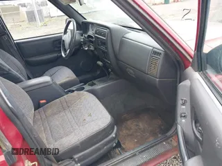 1999 Jeep Cherokee Sport with VIN 1J4FT68S1XL596443, listed as a IAAI auction lot 41767289 with 192,826 mi miles and . Bid and sale history available at DreamBid. Image 5.