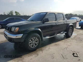 2000 Nissan Frontier XE with VIN 1N6ED27T7YC300373, listed as a Copart auction lot 55829535 with 301,305 mi miles and Salvage title. Bid and sale history available at DreamBid. Image 1.