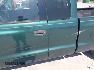 2002 Dodge Dakota with VIN 1B7GL12X32S619222, listed as a IAAI auction lot 41793106 with 97,649 mi miles and . Bid and sale history available at carsss.com. Image 14.