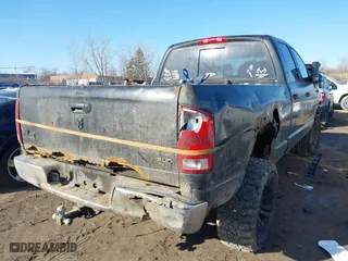 2005 Dodge Ram 1500 SLT with VIN 1D7HU18D05S146937, listed as a IAAI auction lot 41743666 with 252,756 mi miles. Bid and sale history available at carsss.com. Image 4.