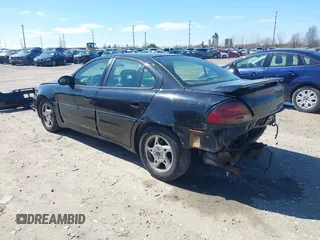 2004 Pontiac Grand Am GT with VIN 1G2NW52E74M683389, listed as a IAAI auction lot 41810159 with 227,091 mi miles. Bid and sale history available at carsss.com. Image 3.