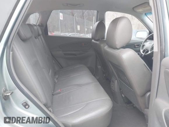 2007 Hyundai Tucson SE with VIN KM8JN12D27U606152, listed as a IAAI auction lot 41465051 with 141,478 mi miles. Bid and sale history available at carsss.com. Image 8.