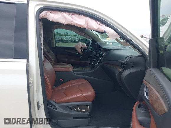 2015 Cadillac Escalade Premium z VIN 1GYS4CKJ4FR216873, wystawiony jako IAAI lot #41677234 z przebiegiem 128 990 mil mil oraz . Historia ofert i sprzedaży dostępna na DreamBid. Obrazek 5.