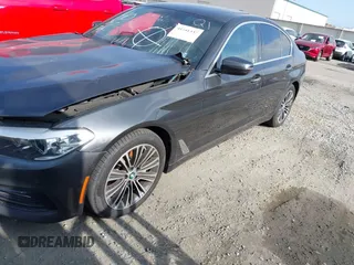 2017 BMW 5 Series 530i with VIN WBAJA5C34HG896047, listed as a IAAI auction lot 41441337 with 83,213 mi miles and . Bid and sale history available at carsss.com. Image 2.