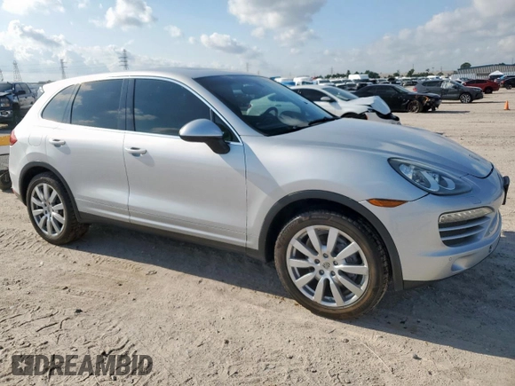 2012 Porsche Cayenne z VIN WP1AA2A22CLA02105, wystawiony jako Copart lot #59392595 z przebiegiem 147 927 mil mil oraz Czysty tytuł • Clean title. Historia ofert i sprzedaży dostępna na DreamBid. Obrazek 4.