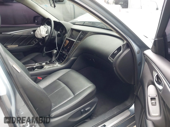 2015 Infiniti Q50 Premium with VIN JN1BV7AP1FM351633, listed as a IAAI auction lot 41880366 with 106,564 mi miles. Bid and sale history available at carsss.com. Image 5.