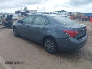 2018 Toyota Corolla L with VIN 2T1BURHE9JC973564, listed as a IAAI auction lot 42356511 with 207,501 mi miles and . Bid and sale history available at DreamBid. Image 3.