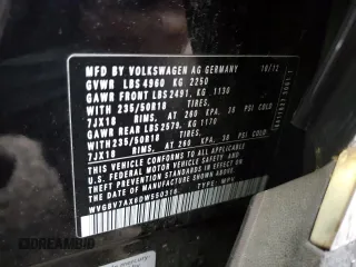 2013 Volkswagen Tiguan SE z VIN WVGBV7AX6DW550316, wystawiony jako Copart lot #56964595 z przebiegiem 157 526 mil mil oraz Szkoda całkowita • Salvage title. Historia ofert i sprzedaży dostępna na DreamBid. Obrazek 13.