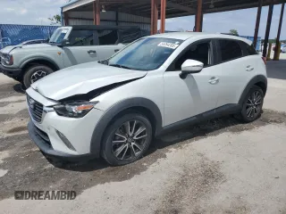 2017 Mazda CX-3 Touring z VIN JM1DKDC78H0150588, wystawiony jako Copart lot #55284205 z przebiegiem 78 923 mil mil oraz Szkoda całkowita • Salvage title. Historia ofert i sprzedaży dostępna na DreamBid. Obrazek 1.