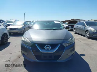 2016 Nissan Maxima SR with VIN 1N4AA6AP9GC414943, listed as a IAAI auction lot 41976295 with 154,738 mi miles and . Bid and sale history available at DreamBid. Image 13.