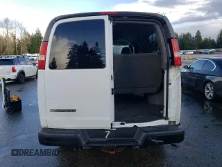 2005 Chevrolet Express Passenger with VIN 1GAHG35U551121466, listed as a Copart auction lot 80658034 with 84,598 mi miles and Salvage title. Bid and sale history available at DreamBid. Image 6.