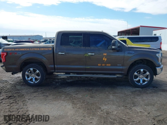 2015 Ford F-150 XLT with VIN 1FTEW1EG8FKE04306, listed as a IAAI auction lot 41864522 with 133,373 mi miles. Bid and sale history available at carsss.com. Image 13.