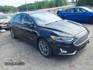 2019 Ford Fusion Titanium z VIN 3FA6P0RU7KR194482, wystawiony jako IAAI lot #42176110 z przebiegiem 80 771 mil mil oraz . Historia ofert i sprzedaży dostępna na DreamBid. Obrazek 1.