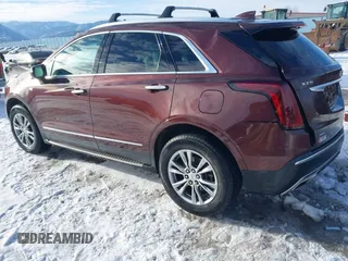 2022 Cadillac XT5 AWD Premium Luxury with VIN 1GYKNDRS9NZ128658, listed as a IAAI auction lot 41330193 with 34,361 mi miles and . Bid and sale history available at DreamBid. Image 3.