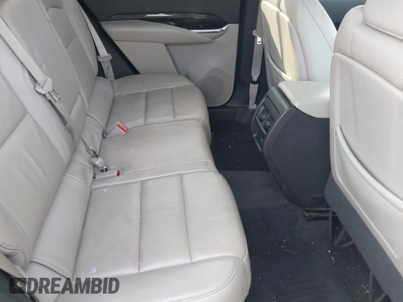 2019 Cadillac XT4 FWD Premium Luxury with VIN 1GYFZCR42KF228986, listed as a IAAI auction lot 42019157 with 79,397 mi miles and . Bid and sale history available at DreamBid. Image 8.