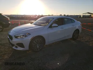 2023 BMW 2 Series 228i with VIN WBA53AK04P7M66299, listed as a Copart auction lot 81856304 with 7,037 mi miles and Salvage Title. Bid and sale history available at carsss.com. Image 1.