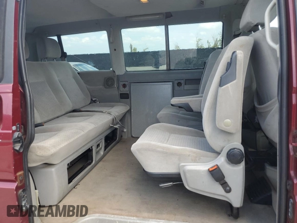 1999 Volkswagen EuroVan с VIN WV2MH2703XH045037, выставлен на аукционе Copart как лот 57109265 с пробегом 265 855 миль миль и Списание • Salvage title. История ставок и продаж доступна на DreamBid. Изображение 11.