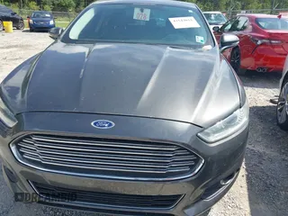 2016 Ford Fusion SE z VIN 3FA6P0HD9GR297069, wystawiony jako IAAI lot #42542012 z przebiegiem 172 444 mil mil oraz . Historia ofert i sprzedaży dostępna na DreamBid. Obrazek 6.