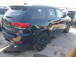 2017 Jeep Grand Cherokee Laredo with VIN 1C4RJFAGXHC817666, listed as a IAAI auction lot 42036817 with 119,698 mi miles. Bid and sale history available at carsss.com. Image 4.