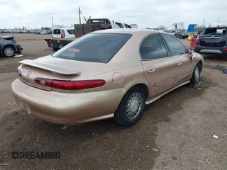 1997 Mercury Sable LS z VIN 1MELM53S8VA602057, wystawiony jako IAAI lot #41468005 z przebiegiem 71 203 mil mil oraz . Historia ofert i sprzedaży dostępna na DreamBid. Obrazek 4.