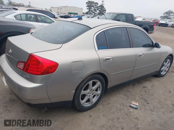 2003 Infiniti G35 with VIN JNKCV51E63M327729, listed as a IAAI auction lot 41970704 with 153,240 mi miles and . Bid and sale history available at DreamBid. Image 4.