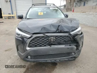 2024 Toyota Corolla Cross XLE with VIN 7MUDAABG2RV107422, listed as a Copart auction lot 47667095 with 8,579 mi miles and Salvage title. Bid and sale history available at DreamBid. Image 5.