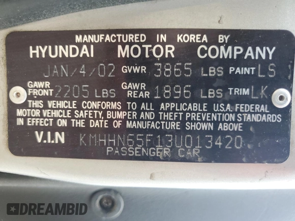 2003 Hyundai Tiburon GT z VIN KMHHN65F13U013420, wystawiony jako Copart lot #51234495 z przebiegiem 230 612 mil mil oraz Szkoda całkowita • Salvage title. Historia ofert i sprzedaży dostępna na DreamBid. Obrazek 14.