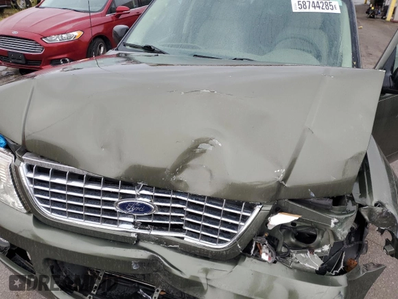 2004 Ford Explorer XLT with VIN 1FMZU73E94UC15155, listed as a Copart auction lot 58744285 with 221,396 mi miles and Salvage title. Bid and sale history available at DreamBid. Image 12.